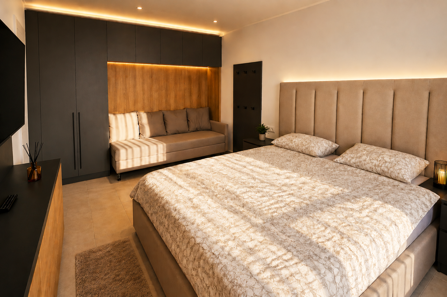 Schlafzimmer mit gepolsterter Bettwand im Emperium Appartement